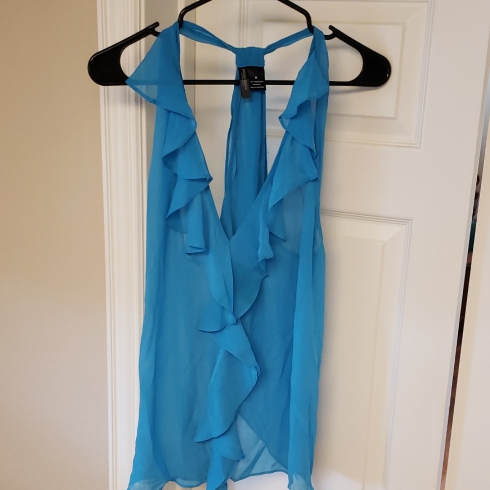 Sheer flowy razor back top with open back